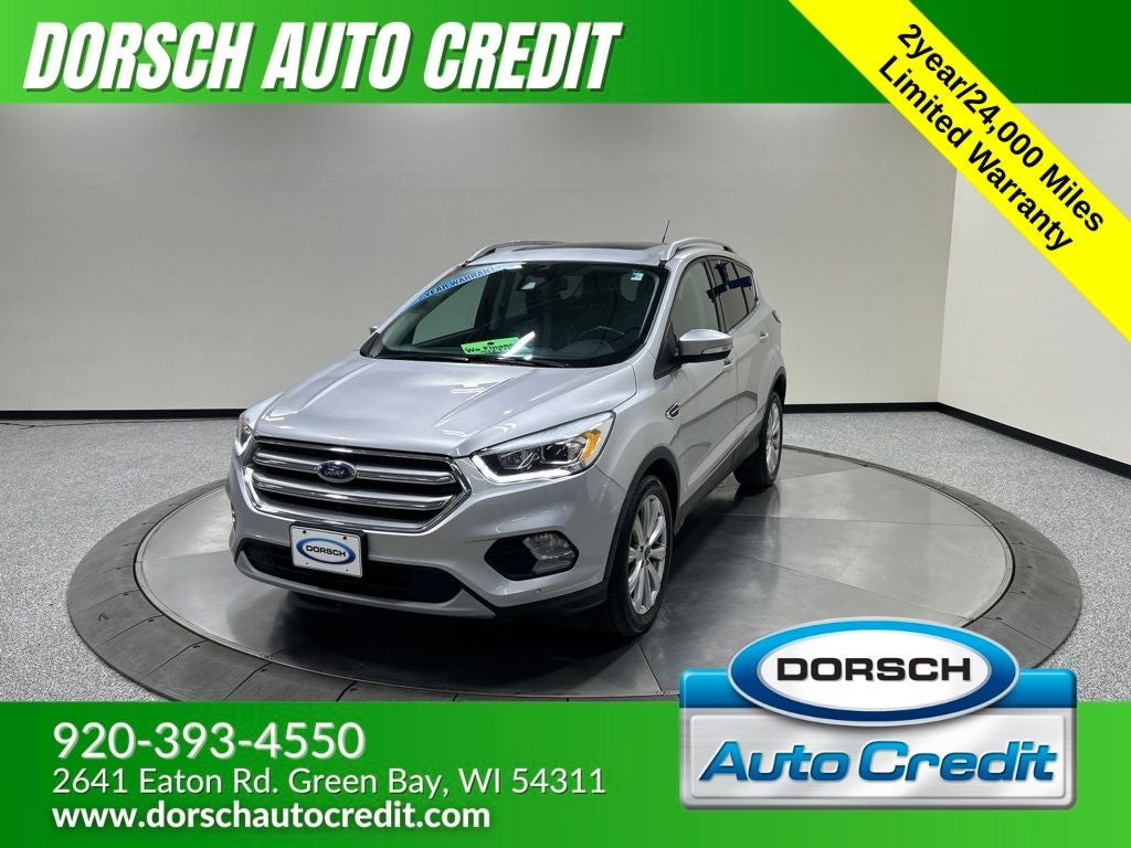 2017 Ford Escape Titanium in Ingot Silver Metallic — front three-quarter view