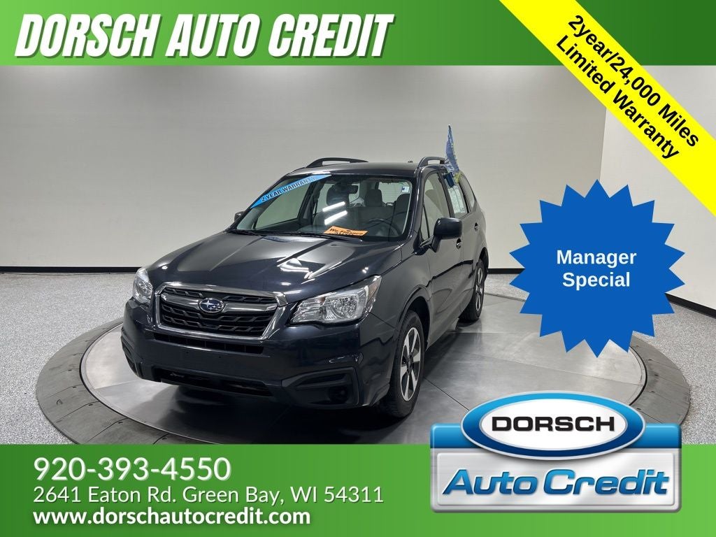 2018 Subaru Forester 2.5i in Dark Gray Metallic — front three-quarter view