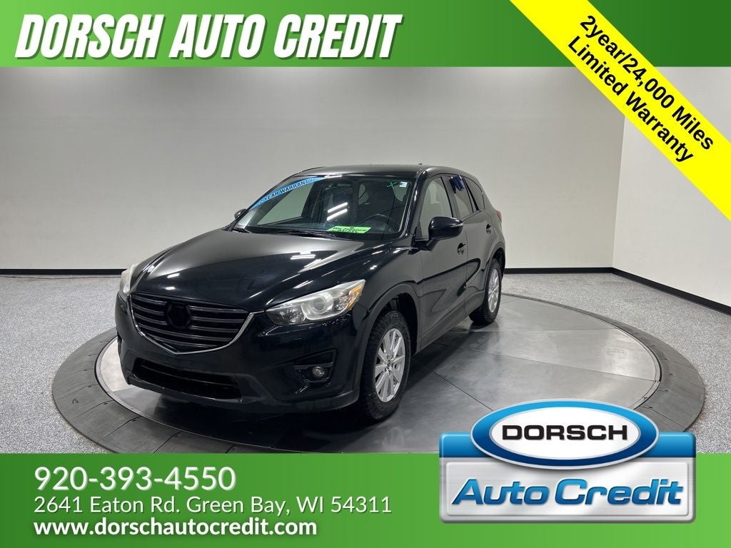 2016 Mazda Mazda CX-5 Touring in Jet Black Mica — front three-quarter view